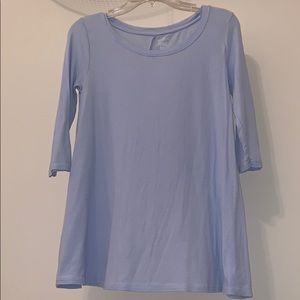 light blue shirt with mid length sleeves
